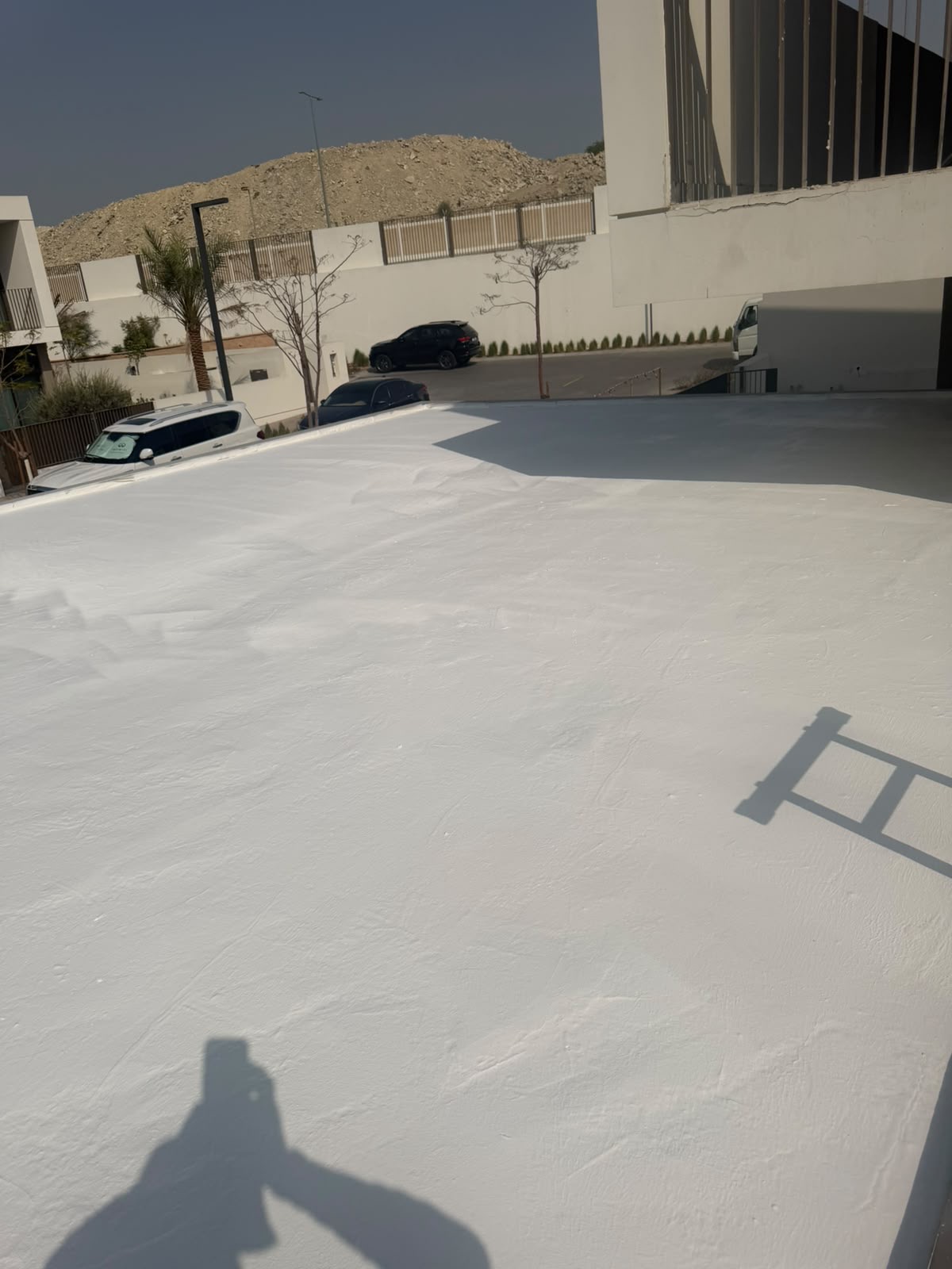 Open white villa roof surface with no covering layers